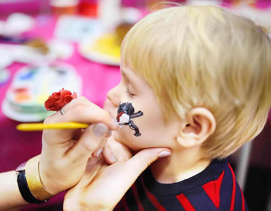 Boy Getting Face Painted at Union Park